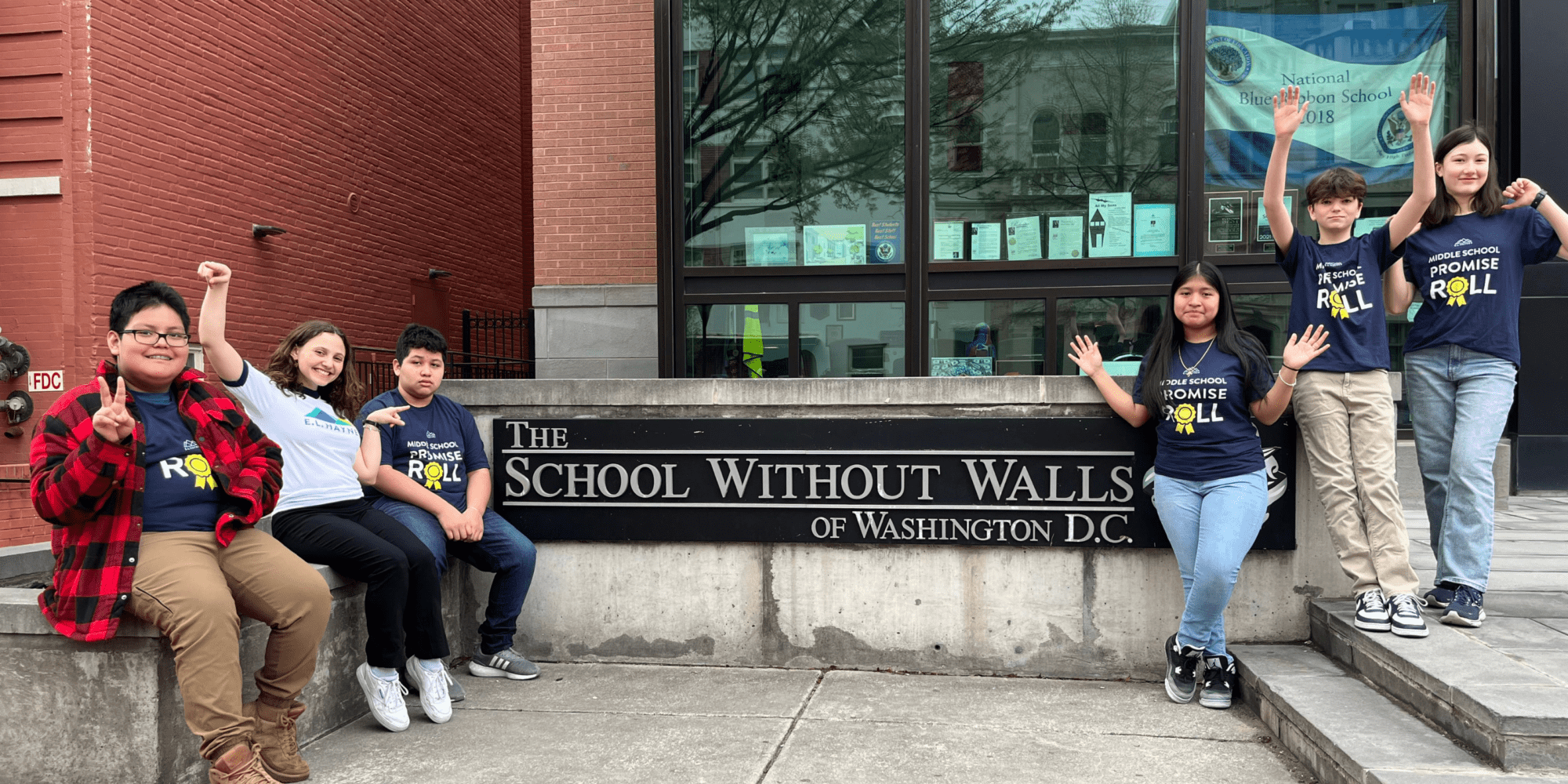 A photo of E.L. Haynes middle school mathletes posing together outside the citywide math competition.