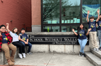 A photo of E.L. Haynes middle school mathletes posing together outside the citywide math competition.
